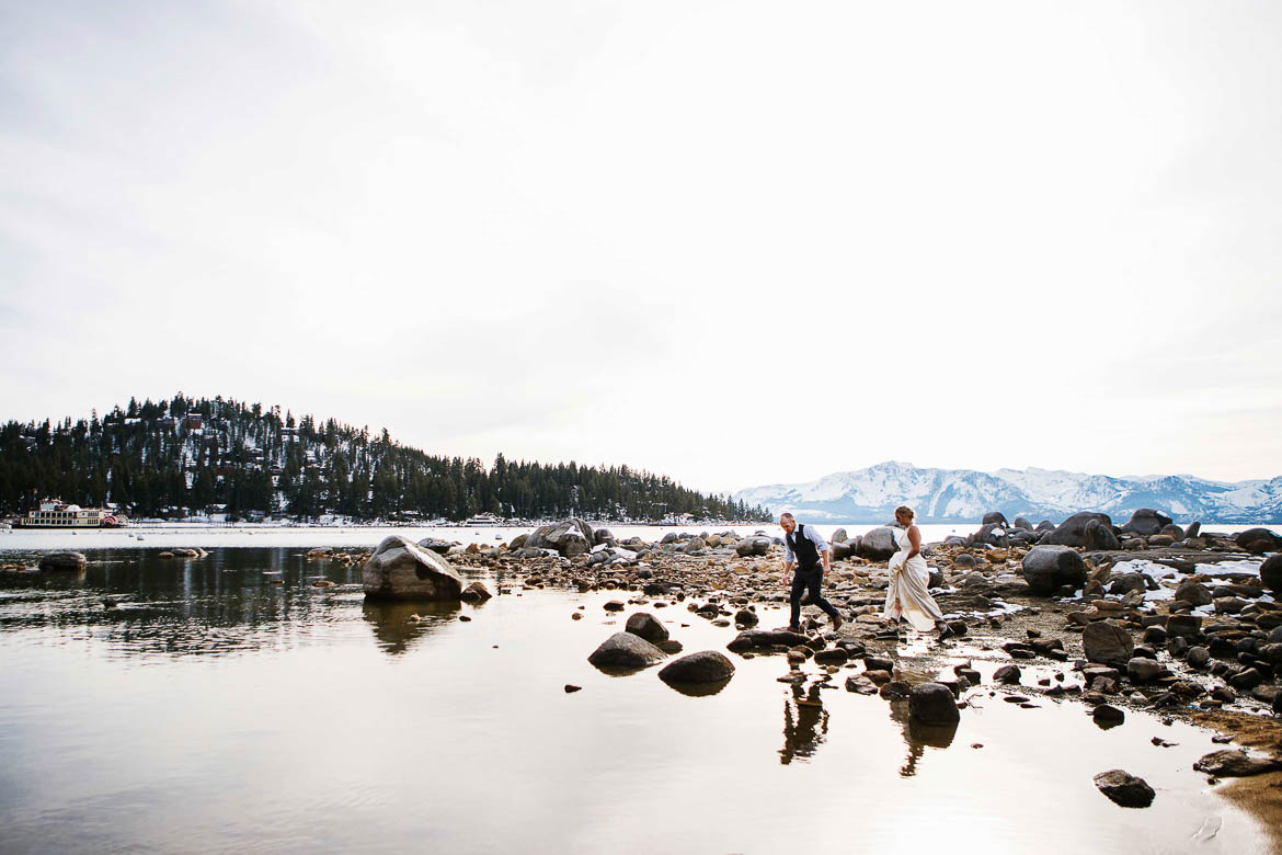 Zephyr Cove Resort Elopement couple on rocks by lake